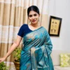 Ocean Mist Silver Zari Katan Silk Saree in teal blue featuring elegant silver floral zari weaving with a luxurious woven border and designer pallu
